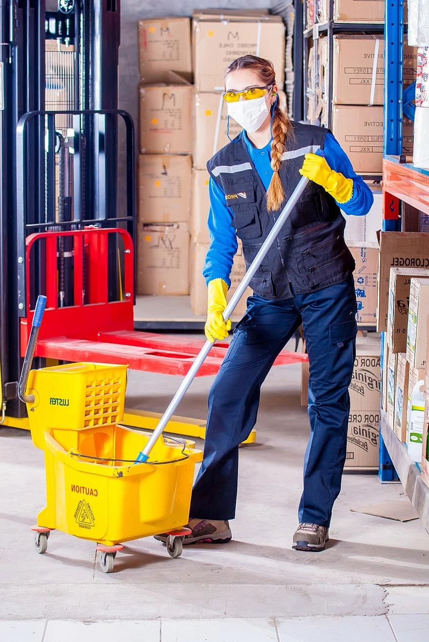 Professional cleaner with cleaning equipment