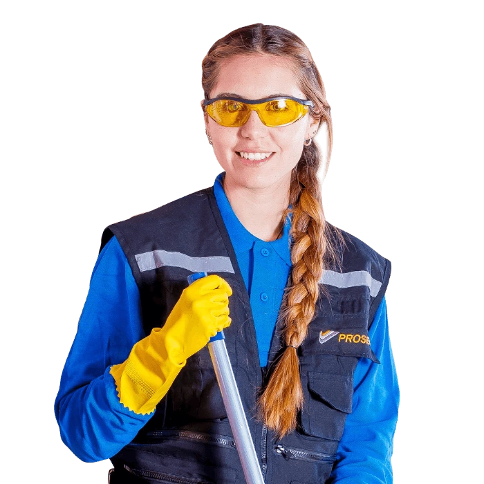 Cleaning professional wearing protective goggles and yellow gloves