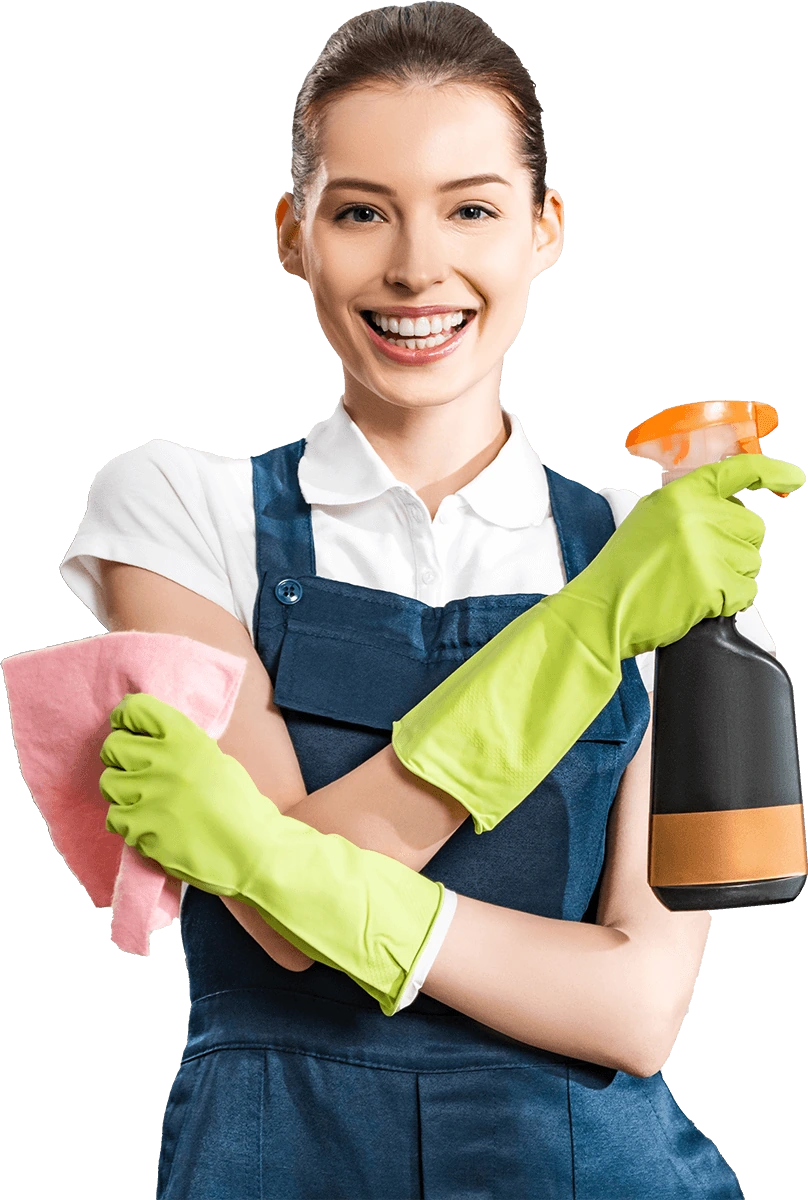 Smiling cleaning professional with cleaning supplies